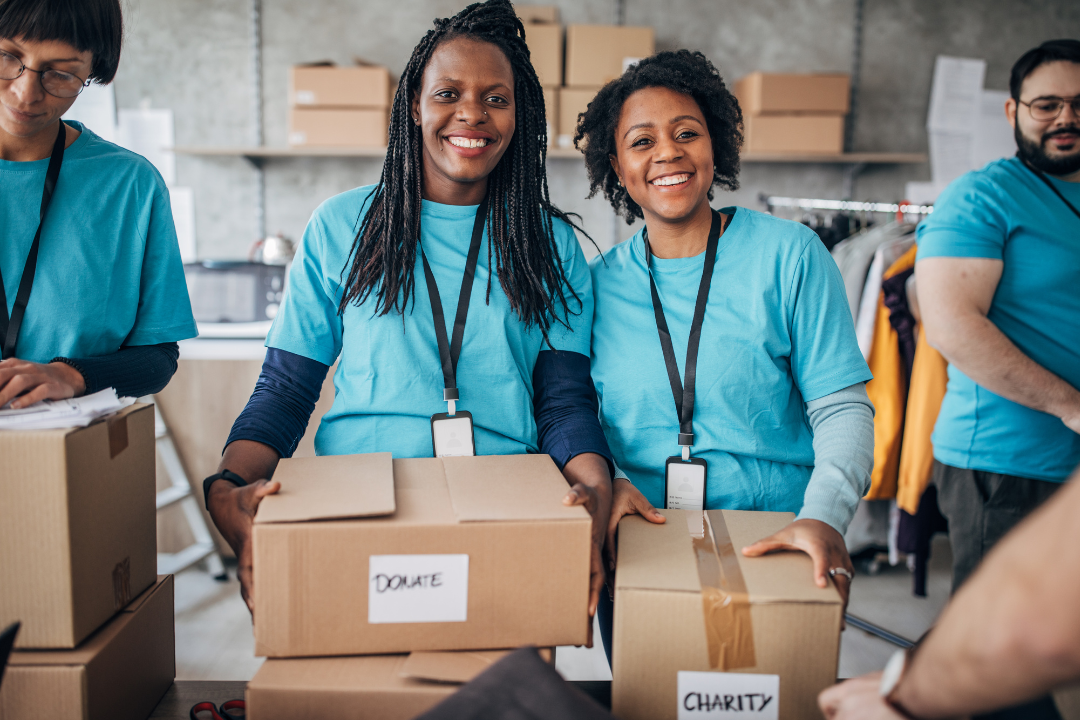 volunteers with boxes